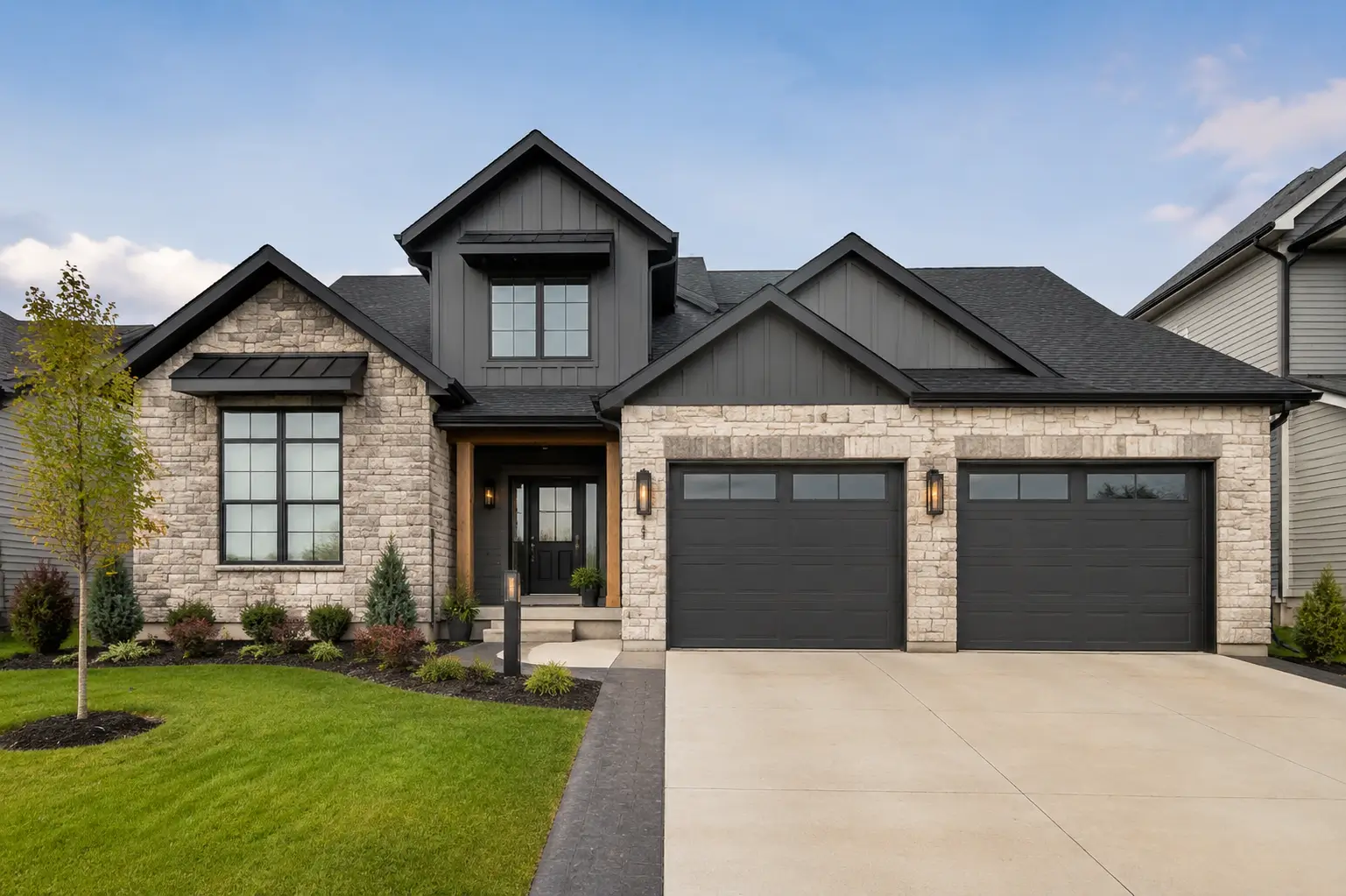 Modern residential garage doors installed on an attractive Whitestown Indiana home